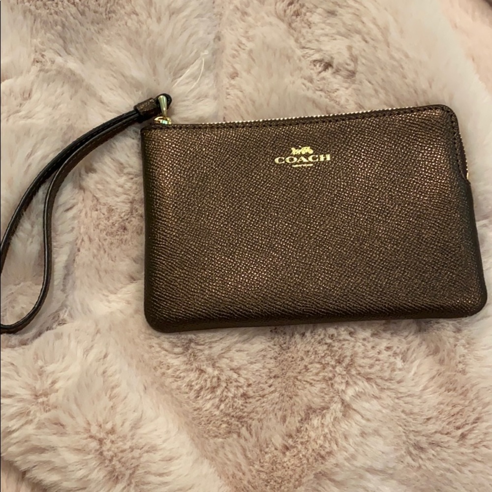 Coach bronze wristlet